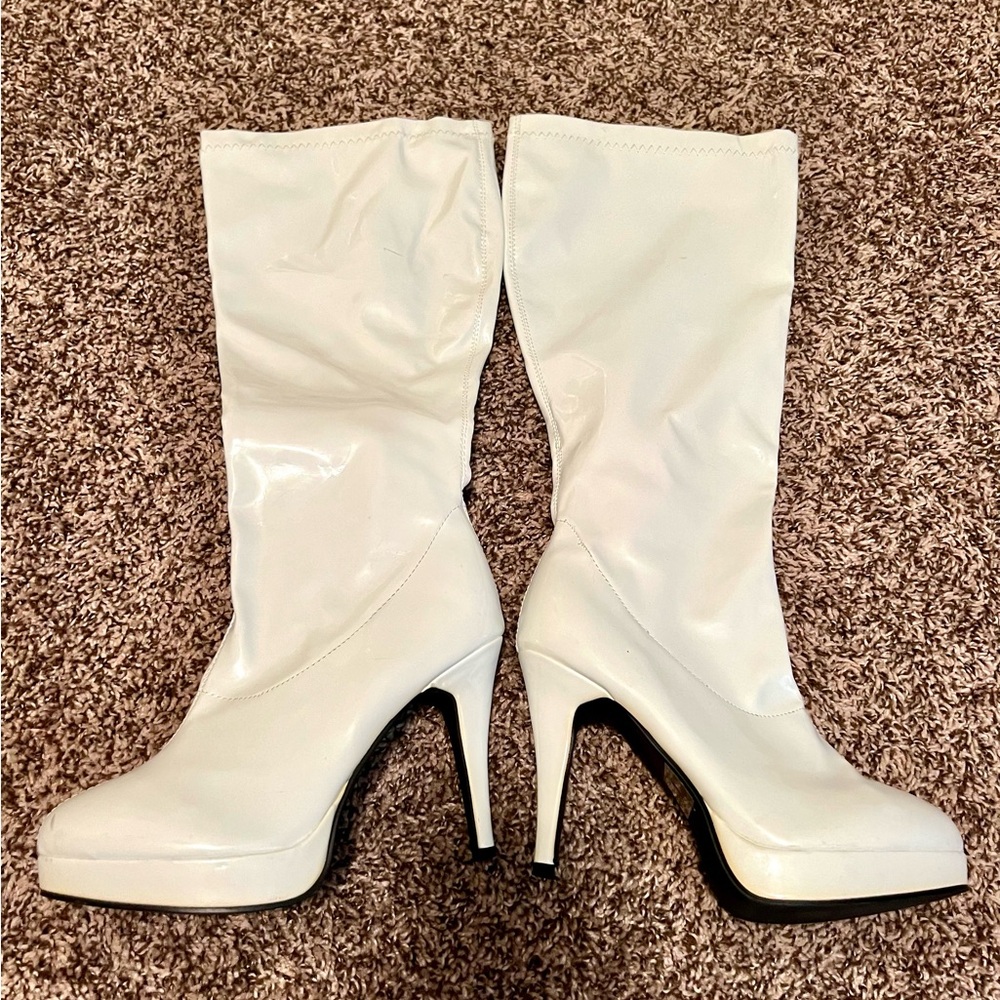 White patent leather high heel boots